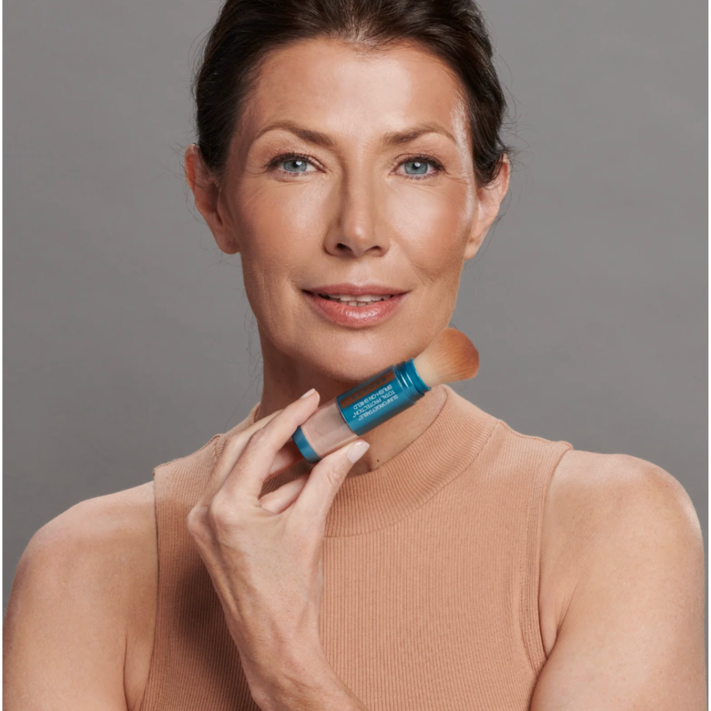 Sunforgettable Brush-On Shield Bronze SPF 50 applied on skin