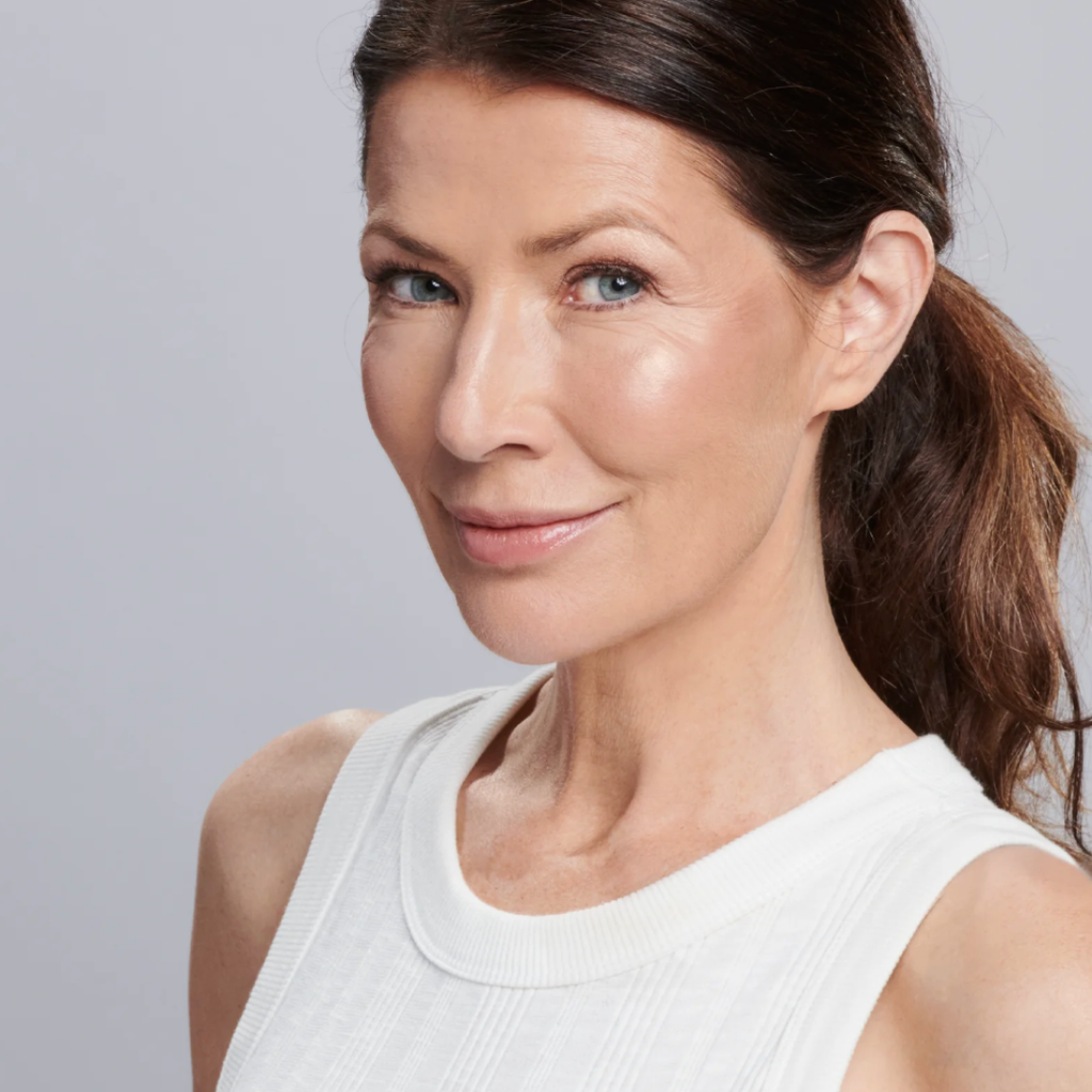 Sunforgettable Brush-On Shield Glow SPF 50 applied on skin